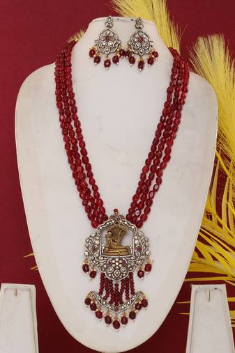 Cz stone studded pendant set with semi precious beads