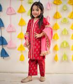 Red block printed kurta with pant and dupatta.
