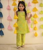 Lemon yellow block printed kurta set with pants.