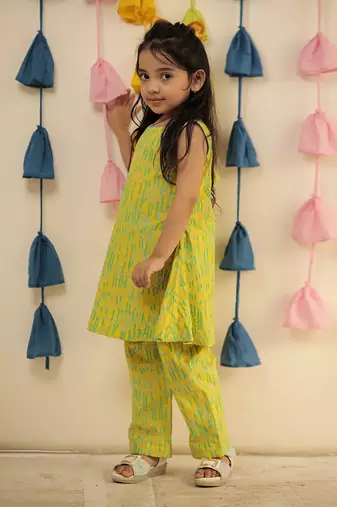 Lemon yellow block printed kurta set with pants.