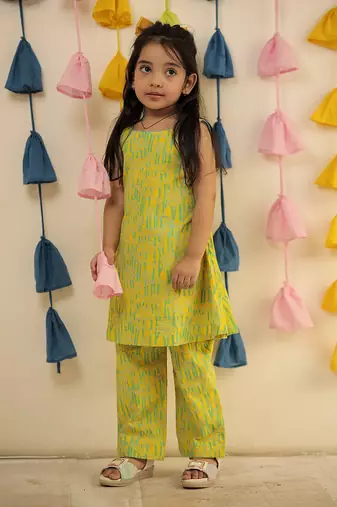Lemon yellow block printed kurta set with pants.