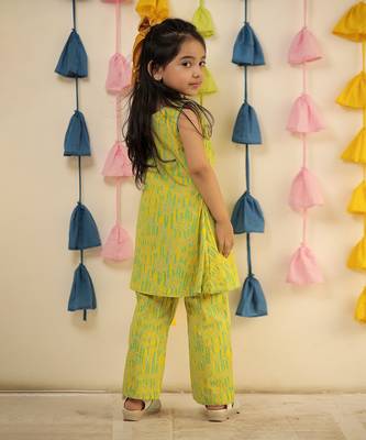 Lemon yellow block printed kurta set with pants. 5