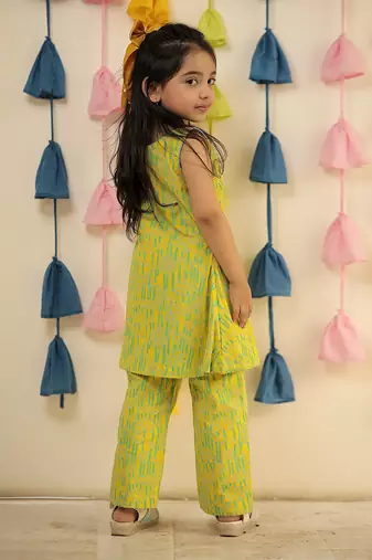 Lemon yellow block printed kurta set with pants.