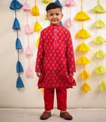 Red block printed kurta set.