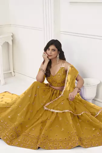 Women's Mustard Yellow Butterfly Net With Tone Thread Work And Sandwich Embroidered Work Lehenga Choli For Wedding