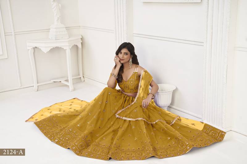 Women's Mustard Yellow Butterfly Net With Tone Thread Work And Sandwich Embroidered Work Lehenga Choli For Wedding