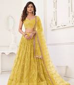 Glamorous Yellow Net With Sequins And Thread Embroidery Real Mirror Work Lehenga Choli For Wedding
