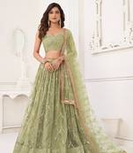 Glamorous Pista Green Net With Sequins And Thread Embroidery Real Mirror Work Lehenga Choli For Wedding