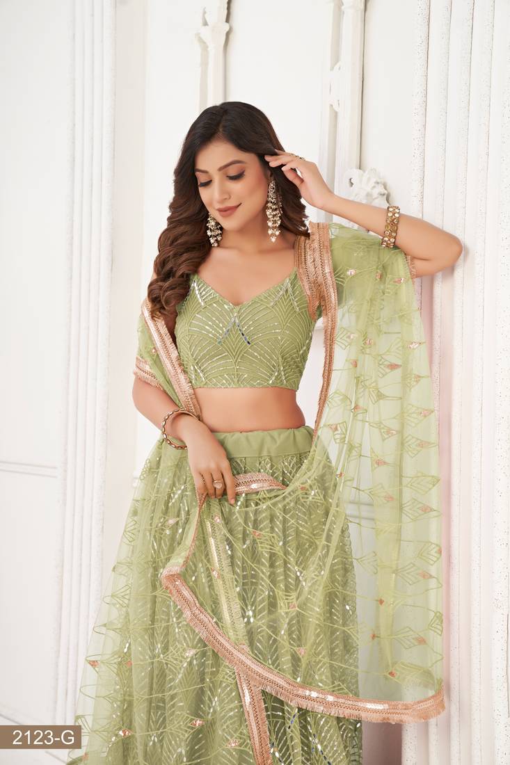Glamorous Pista Green Net With Sequins And Thread Embroidery Real Mirror Work Lehenga Choli For Wedding