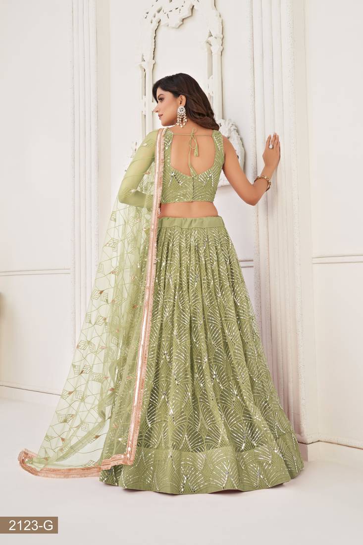 Glamorous Pista Green Net With Sequins And Thread Embroidery Real Mirror Work Lehenga Choli For Wedding