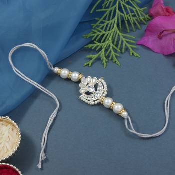 designer kundan pearl rakhi with roli chawal & rakshabandhan card for brother/bro/bhai/men  1
