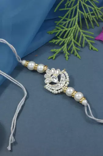 designer kundan pearl rakhi with roli chawal & rakshabandhan card for brother/bro/bhai/men (r143gr)