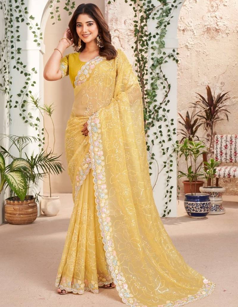 yellow embroidered saree with designer pallu for haldi ceremony 