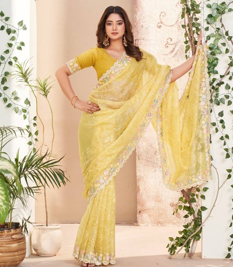 yellow embroidered saree with designer pallu for haldi ceremony 