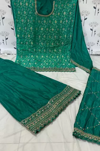 Green colour zari woven chinnon fabric heavy partywear sharara dress