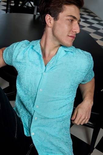 Men's light blue creased shirt