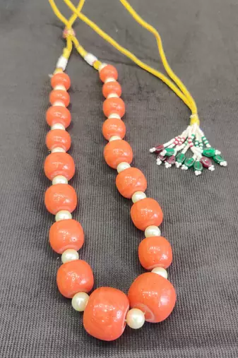 Orange coral necklaces