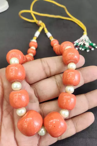 Orange coral necklaces