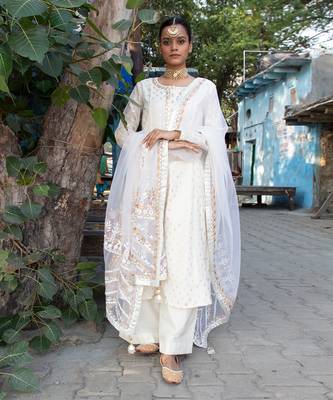Off- white banarsi booti embroidered suit 1