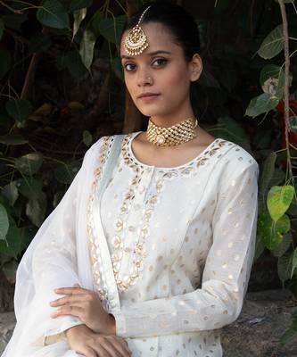 Off- white banarsi booti embroidered suit 4