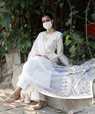 Off- white banarsi booti embroidered suit 5