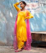 Alphanso yellow gown with fuchsia cape