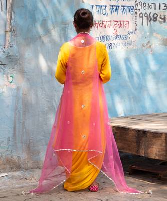 Alphanso yellow gown with fuchsia cape 3