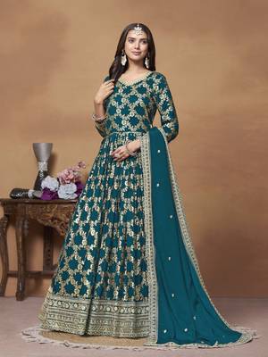 Teal blue dola jacquard jacquard woven with thread embroidery work salwar kameez 1