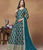 Teal blue dola jacquard jacquard woven with thread embroidery work salwar kameez