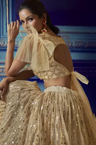 Enticing Beige Sequins Net Wedding Wear Lehenga Choli With Dupatta