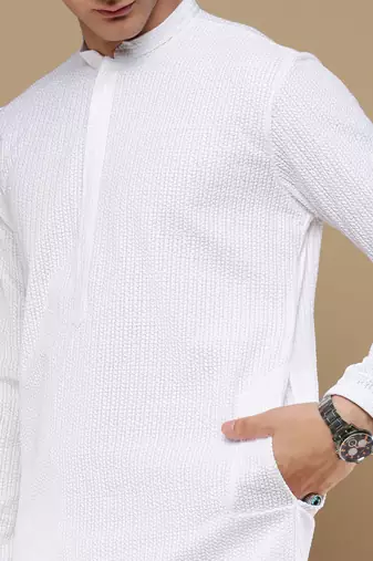 Unleash your style with men's white cotton chikankari designer kurta set by sanwara