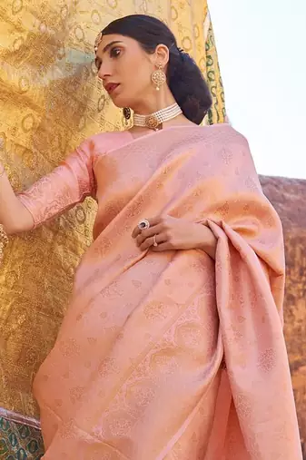 Peach kanjivaram style of silk bland thread & Zari weaving saree with Blouse