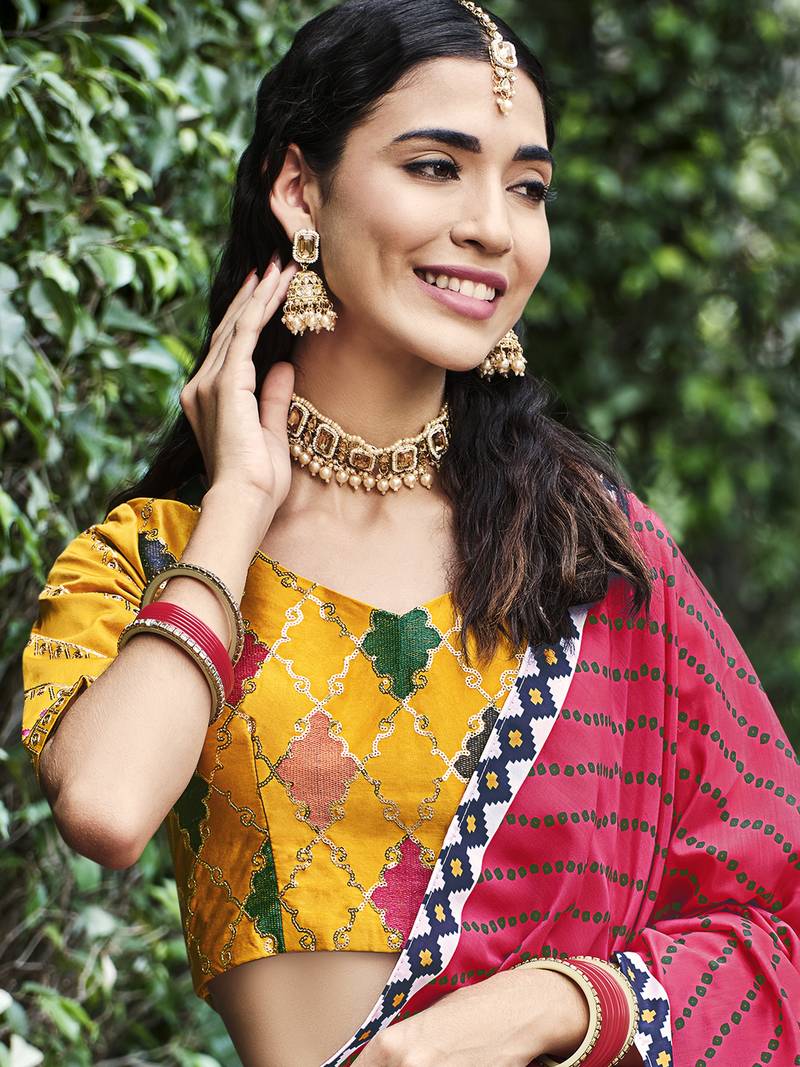 Mesmerizing Yellow Colored Thread & Sequins Embroidered Silk Lehenga choli with Pink Maslin Cotton Fabric Dupatta