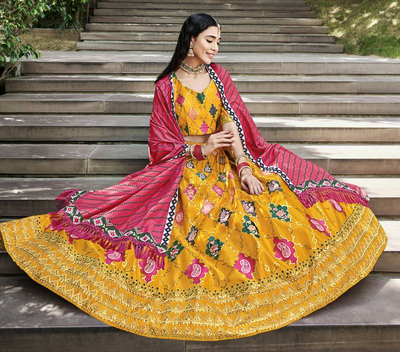Mesmerizing Yellow Colored Thread & Sequins Embroidered Silk Lehenga choli with Pink Maslin Cotton Fabric Dupatta