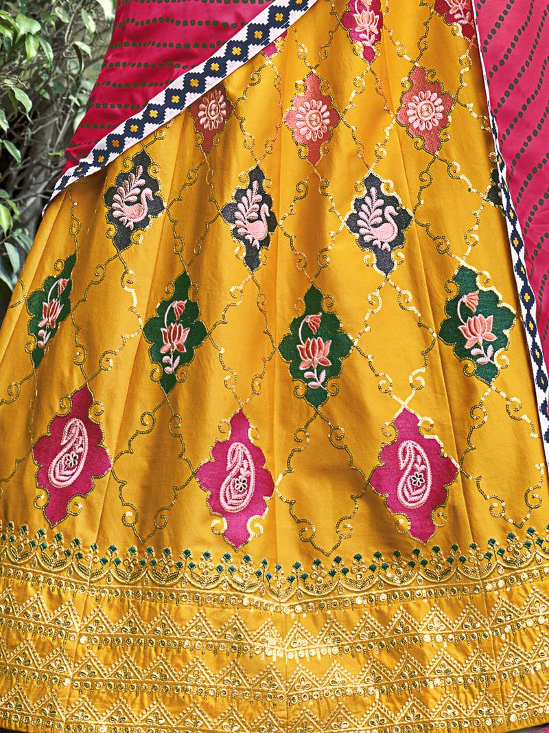 Mesmerizing Yellow Colored Thread & Sequins Embroidered Silk Lehenga choli with Pink Maslin Cotton Fabric Dupatta