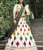 Delightful White Colored Thread & Sequins Embroidered Silk Lehenga choli with Green Gajji Silk Fabric Dupatta