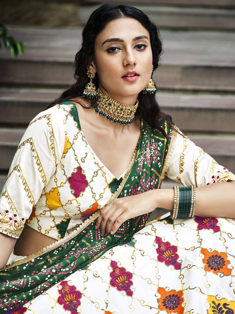 Delightful White Colored Thread & Sequins Embroidered Silk Lehenga choli with Green Gajji Silk Fabric Dupatta