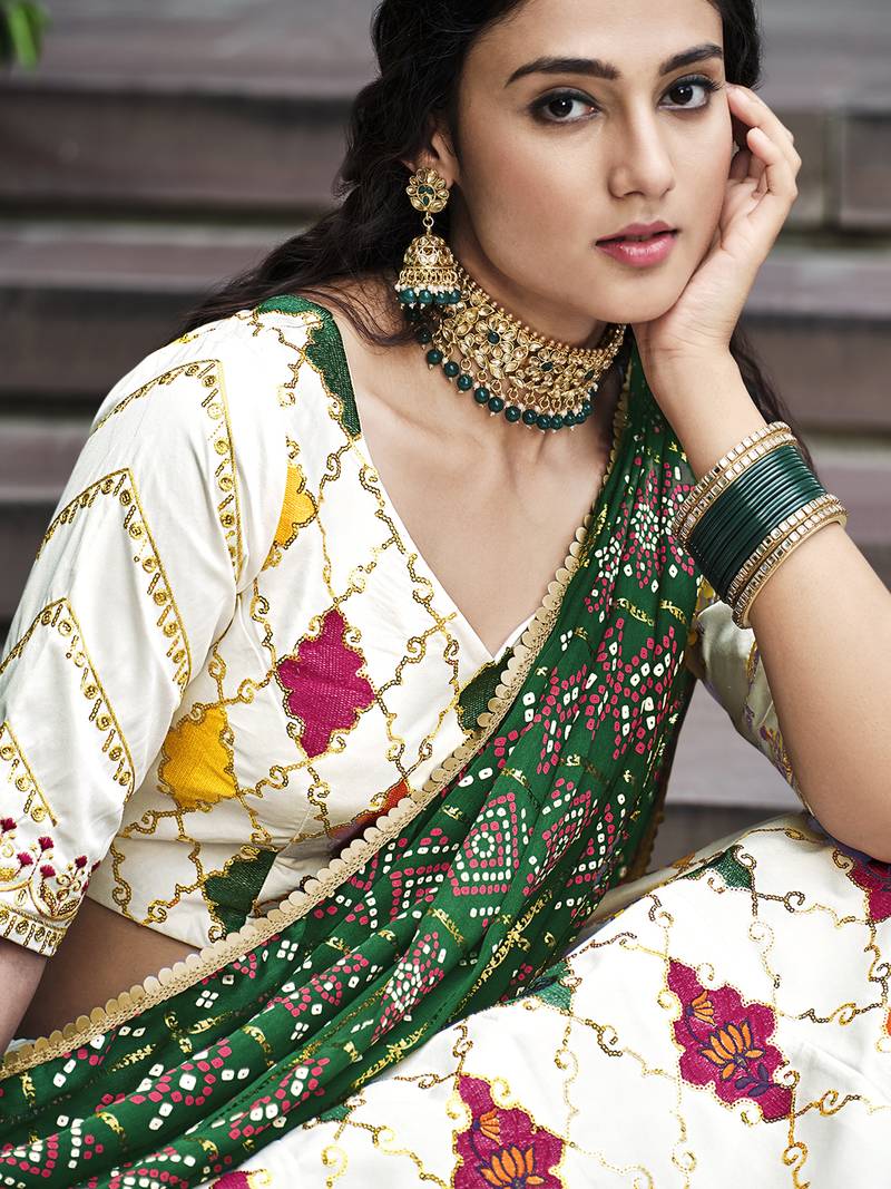 Delightful White Colored Thread & Sequins Embroidered Silk Lehenga choli with Green Gajji Silk Fabric Dupatta