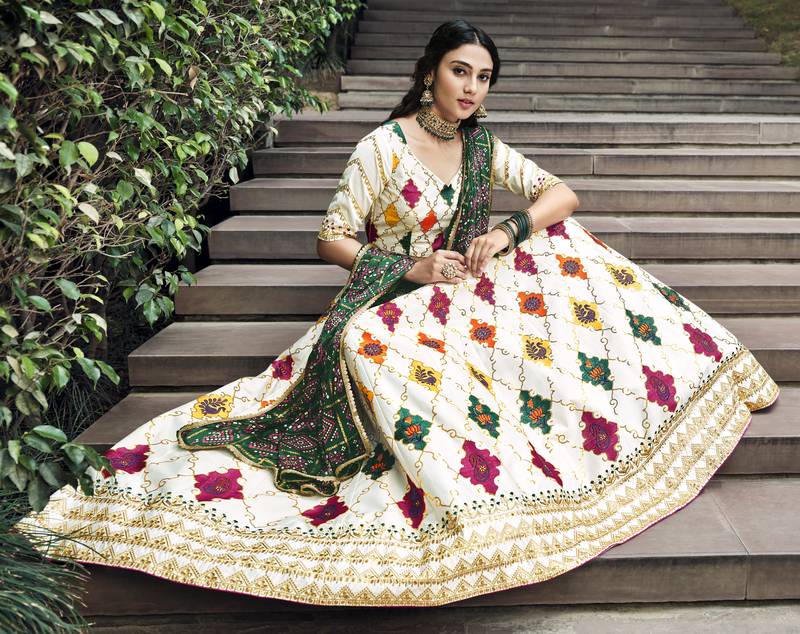 Delightful White Colored Thread & Sequins Embroidered Silk Lehenga choli with Green Gajji Silk Fabric Dupatta