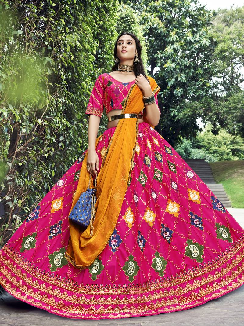 Seductive Rani Pink Colored Thread & Sequins Embroidered Silk Lehenga choli with Mustared Yellow Georgette Dupatta