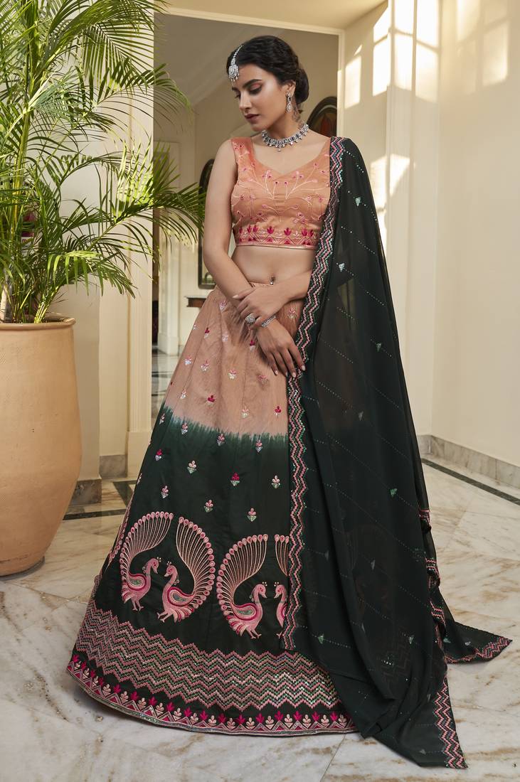 Fetching Rust Orange-Green Thread And Sequince Embroidered With Mirror Work Art Silk Designer Lehenga Choli 