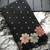 Balck colour  pure soft silk saree with copper and gold weaving flower panel