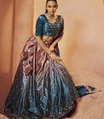 Marvelous Teal Blue Sequins Embroidered With All Over Mirror Work Velvet Party Wear Lehenga Choli