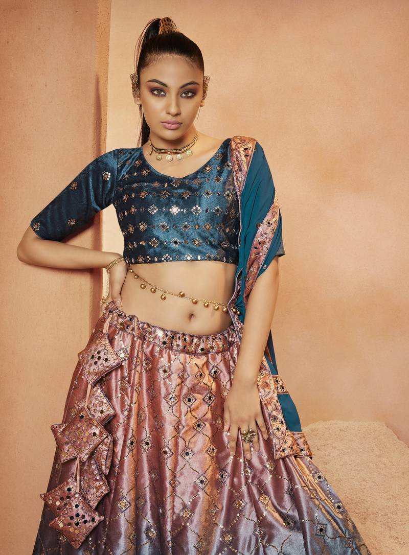 Marvelous Teal Blue Sequins Embroidered With All Over Mirror Work Velvet Party Wear Lehenga Choli