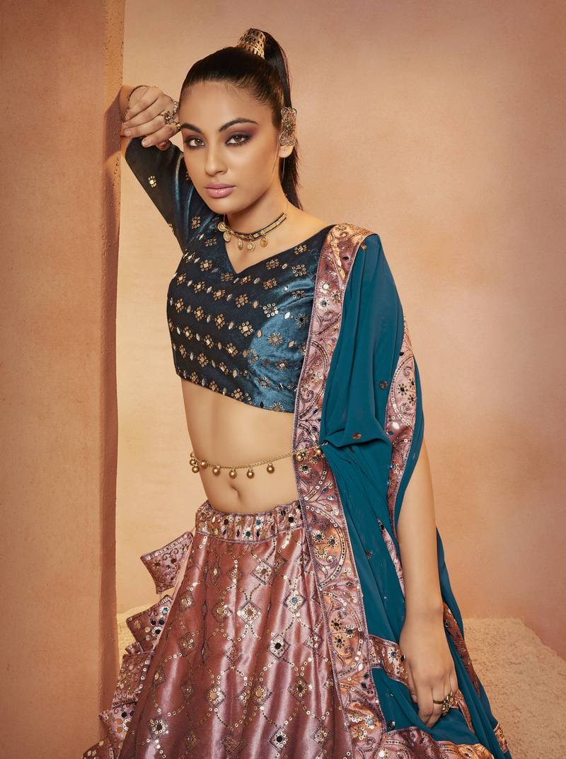 Marvelous Teal Blue Sequins Embroidered With All Over Mirror Work Velvet Party Wear Lehenga Choli