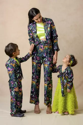 Jungle print coat with loose fitted straight pants and neon stretchable round neck t shirt