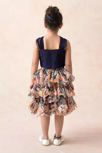 Knot top with jungle print ruffle skirt