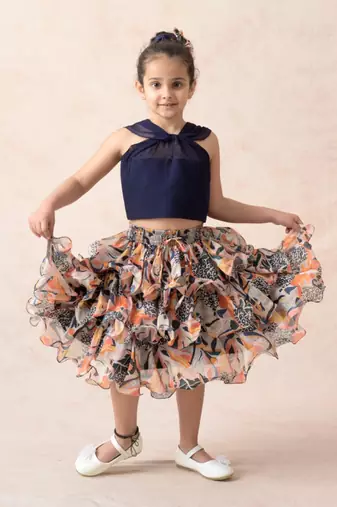 Knot top with jungle print ruffle skirt