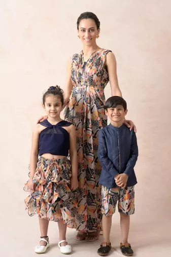 Knot top with jungle print ruffle skirt