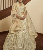 Beige Colored Thread & Sequins Embroidered Art Silk Lehenga Choli For Bride